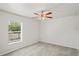 Bedroom boasts neutral walls and carpet creating a comfortable and inviting retreat at 13098 Hanley Dr, Spring Hill, FL 34609