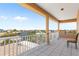 Balcony with views of neighborhood canals and waterways under a bright blue sky at 13810 Celida Ave, Hudson, FL 34667