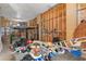 Large garage with plenty of space for a car lift or storing recreational equipment at 13810 Celida Ave, Hudson, FL 34667