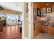 Bright living room featuring hardwood floors, light-filled windows, and views of the outdoors at 13810 Celida Ave, Hudson, FL 34667