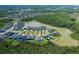 Community aerial view with serene lakes, and lush landscaping at 16557 Acoustic Loop, Land O Lakes, FL 34638