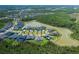 Aerial view of home backing to lake and preserve in exclusive gated community at 16557 Acoustic Loop, Land O Lakes, FL 34638