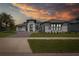 Attractive single-story home with a well-kept lawn and charming curb appeal at 16557 Acoustic Loop, Land O Lakes, FL 34638