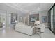 Spacious living room with recessed lighting, neutral colors, and views of the outdoors at 16557 Acoustic Loop, Land O Lakes, FL 34638