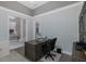 Functional home office with a traditional desk, ample storage, and neutral color scheme at 16557 Acoustic Loop, Land O Lakes, FL 34638