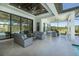 Spacious covered patio featuring comfortable seating and views at 16557 Acoustic Loop, Land O Lakes, FL 34638