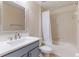 Bathroom featuring vanity with mirror and a shower with white curtain at 18353 Briar Oaks Dr, Hudson, FL 34667