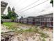 Spacious backyard is framed by a wood fence at 1919 Harpoon Dr, Holiday, FL 34690