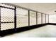 Spacious, enclosed patio area with lattice screens at 1919 Harpoon Dr, Holiday, FL 34690