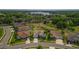 Aerial view of the property, showcasing the home's well-manicured front lawn at 22118 Yachtclub Ter, Land O Lakes, FL 34639
