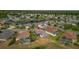 Beautiful home with screened pool in a peaceful neighborhood with lush landscaping and serene pond views at 22118 Yachtclub Ter, Land O Lakes, FL 34639