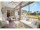 Inviting screened lanai offers a relaxing outdoor space with stylish seating, perfect for entertaining or relaxing at 22118 Yachtclub Ter, Land O Lakes, FL 34639
