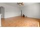 Large open living space with wood floors and bright natural light at 22118 Yachtclub Ter, Land O Lakes, FL 34639