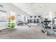 Well-equipped community gym featuring modern exercise machines, weights, and ceiling fans at 3208 Living Coral Dr, Odessa, FL 33556