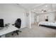Bright main bedroom with a ceiling fan and a separate desk area for convenient working from home at 3208 Living Coral Dr, Odessa, FL 33556