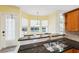 Kitchen with stainless steel sink, granite countertop, and windows with a view of the pool at 4080 Gevalia Dr, Brooksville, FL 34604