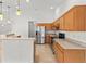 Spacious kitchen with stainless steel appliances and ample cabinet space at 4335 Duval St, Spring Hill, FL 34606