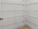 Walk-in pantry with ample shelving, providing generous storage space at 4335 Duval St, Spring Hill, FL 34606