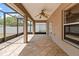 Covered and screened outdoor patio with durable tile flooring at 4335 Duval St, Spring Hill, FL 34606