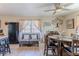 Comfortable living area with wood floors, natural light, and contemporary decor at 447 Briarwood Ln, Spring Hill, FL 34606