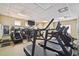 Well-equipped fitness center featuring modern treadmills, elliptical machines, and mirrored walls at 4500 Golf Club Ln, Spring Hill, FL 34609