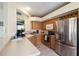 A well-equipped kitchen with stainless steel appliances, and ample counter space at 4500 Golf Club Ln, Spring Hill, FL 34609