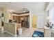 Bright kitchen features stainless steel appliances and convenient access to the dining and living areas at 4500 Golf Club Ln, Spring Hill, FL 34609