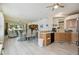 View of the kitchen, dining room and living room in this open concept home at 4500 Golf Club Ln, Spring Hill, FL 34609
