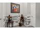 Tasteful entry with decorative wainscoting and unique art pieces at 4910 Southern Valley Loop, Brooksville, FL 34601