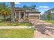 Charming single-Gathering home with well-manicured landscaping and a spacious two-car garage at 4910 Southern Valley Loop, Brooksville, FL 34601