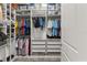 Walk-in closet provides ample storage space with shelving and hanging racks at 4910 Southern Valley Loop, Brooksville, FL 34601