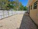 Backyard features a white fence and brick ground at 5147 Larch Ln, New Port Richey, FL 34653