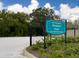 Sign showing the entrance to the New Port Richey Meadows Park at 5147 Larch Ln, New Port Richey, FL 34653
