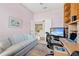 Comfortable home office space with access to living areas at 5164 Golf Club Ln, Spring Hill, FL 34609