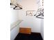 Walk-in closet with racks, shelves and carpeted flooring at 5248 Frost Rd, Spring Hill, FL 34606