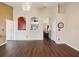 Open floorplan with views into other living spaces and a stylish chandelier at 5341 Birchwood Rd, Spring Hill, FL 34608