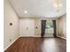 Spacious living area with hardwood floors and natural light at 5341 Birchwood Rd, Spring Hill, FL 34608