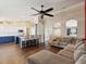 Open-concept living area with a view into kitchen at 5341 Birchwood Rd, Spring Hill, FL 34608