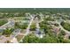 Real estate aerial view of property near Northcliffe Blvd in wooded neighborhood at 5378 Mosquero Rd, Spring Hill, FL 34606