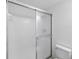 Bathroom showing tiled shower stall and toilet at 5378 Mosquero Rd, Spring Hill, FL 34606