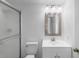 Bathroom featuring shower, mirror, vanity and toilet at 5378 Mosquero Rd, Spring Hill, FL 34606