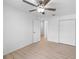 Bedroom featuring wood-look floors and closet at 5378 Mosquero Rd, Spring Hill, FL 34606