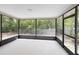 Spacious screened porch offering a relaxing outdoor living area at 5378 Mosquero Rd, Spring Hill, FL 34606