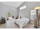 Bedroom with a sliding glass door leading to a patio and a private in-ground pool at 5638 Hereford Dr, New Port Richey, FL 34655