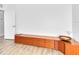 Large entertainment center and sleek floors in spacious living room at 5638 Hereford Dr, New Port Richey, FL 34655