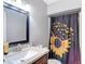Bathroom featuring laminate counters, and a vanity with stainless steel fixtures at 6203 Sumter Dr, Brooksville, FL 34602