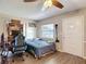 Bedroom featuring a desk, a computer, and hardwood floors at 6203 Sumter Dr, Brooksville, FL 34602