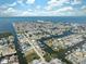 Waterfront community featuring canal access with docks and boat parking spaces, lush trees, and well-maintained homes at 6521 Boatyard Dr, Hudson, FL 34667