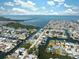 Waterfront community featuring canal access with docks and boat parking spaces, lush trees, and well-maintained homes at 6521 Boatyard Dr, Hudson, FL 34667