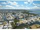 Waterfront community featuring canal access with docks and boat parking spaces, lush trees, and well-maintained homes at 6521 Boatyard Dr, Hudson, FL 34667